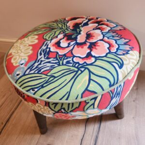 Small round footstool, in Thibaut Honshu Dynasty Red and Blue, with premium angled wooden legs.