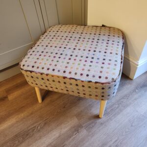 A beautiful handmade medium sized Footstool, Upholstered Coffee Table, in Abraham Moon Multispot wool fabric.